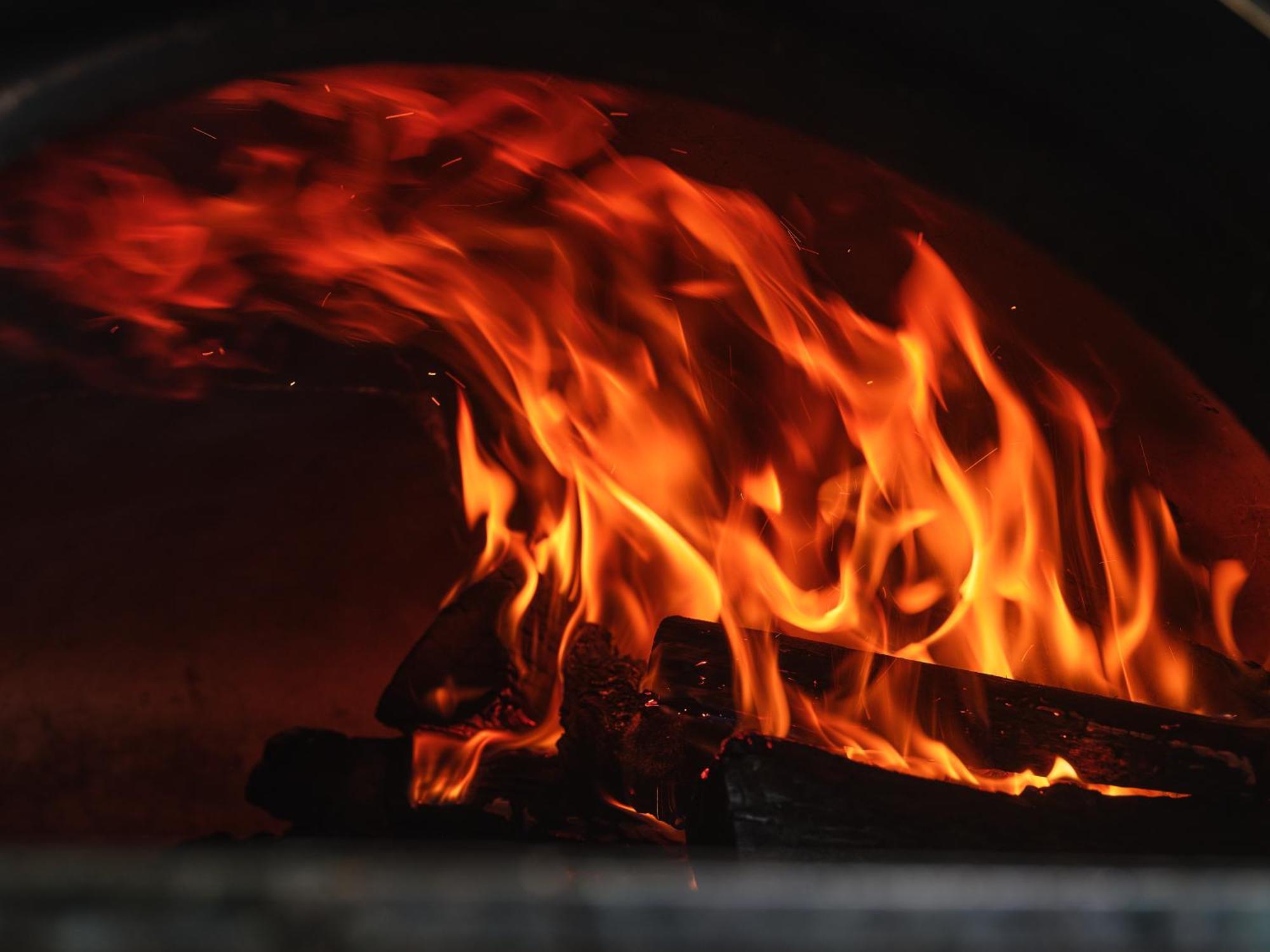 Peppers Marysville Exterior photo Wood burning in a wood-fired oven